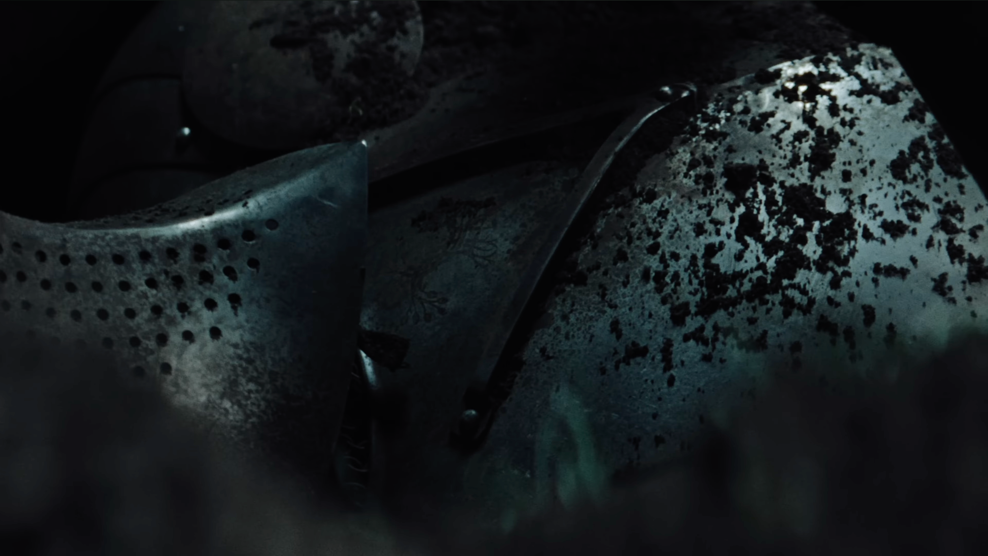 Close-up of the Knight's armor and chestplate from the False Light music video